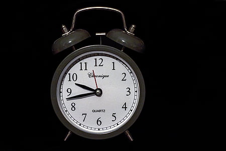 grey and white alarm clock at 10:43