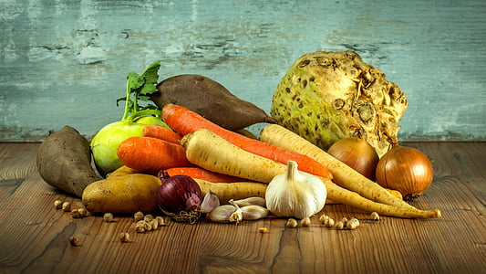 assorted vegetables on brown surface