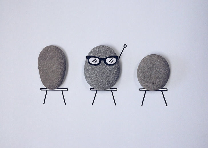 three gray stone pebbles