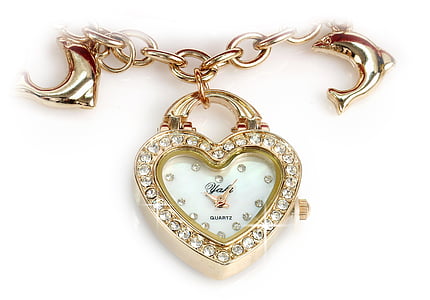 gold-colored clear gemstone encrusted heart pendant