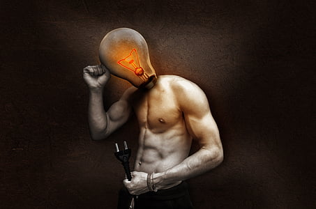 man with bulb head holding 2-prong cable