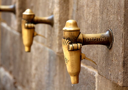 brass-colored Barcelona faucets