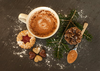 cappuccino with cookies and pine tree