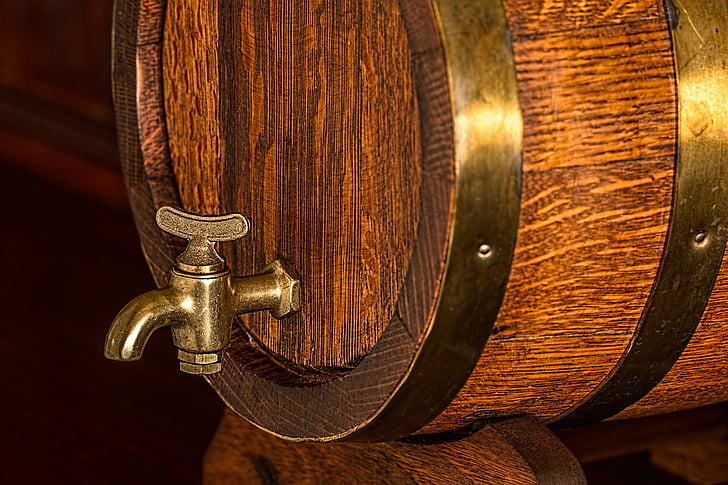brown wooden beer barrel dispenser
