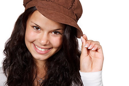 woman wearing brown cap