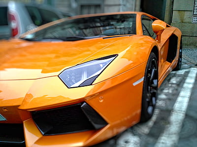 closeup photo of orange Lamborghini Aventador