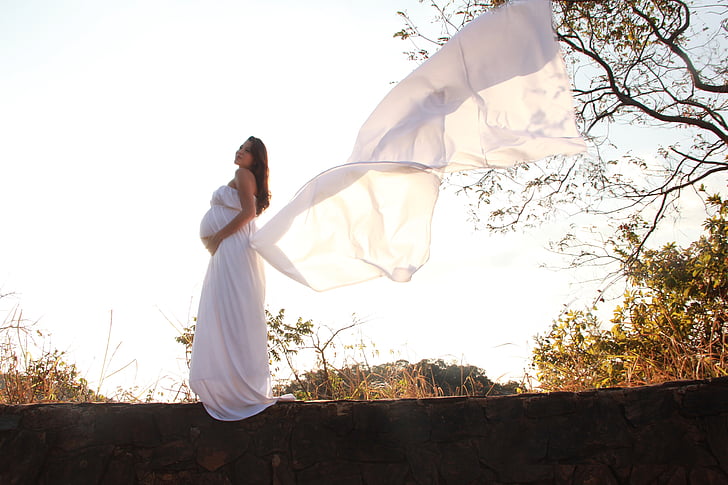 woman wearing white long dress