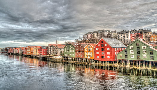 assorted-color houses near bodies of water panoramic photography
