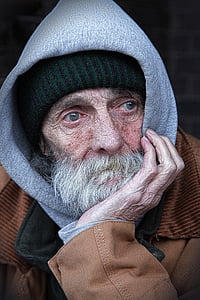 portrait photography of man in gray hoodie