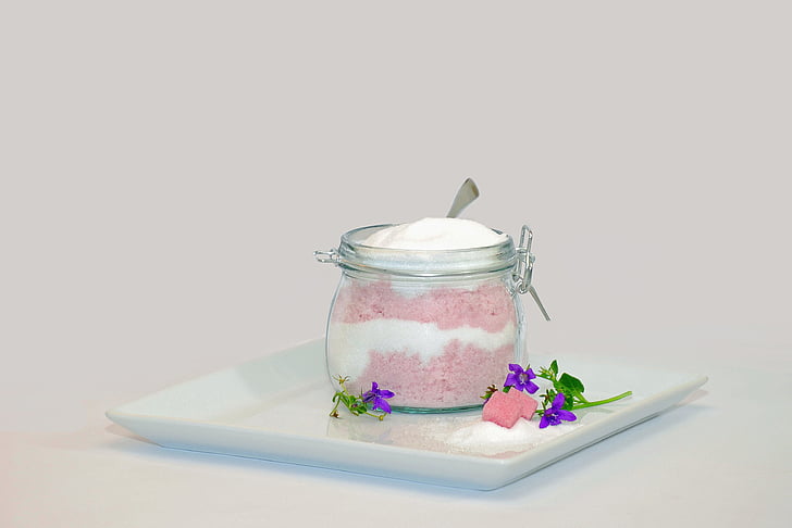 clear glass jar with cream