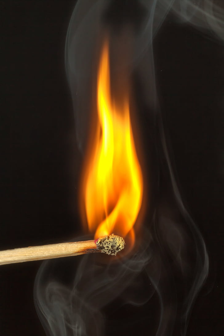burning brown matchstick