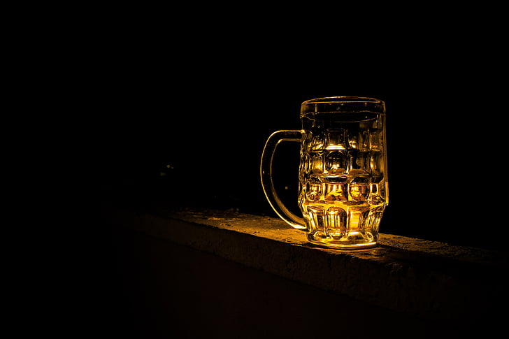 clear glass mug with brown light