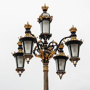 black and gold-colored light lantern