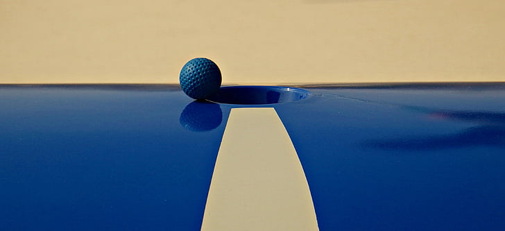 blue ball near hole