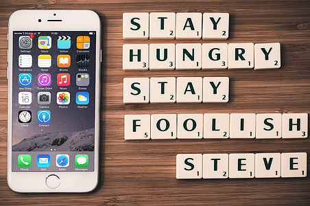 silver iPhone 6 and scrambled quotes