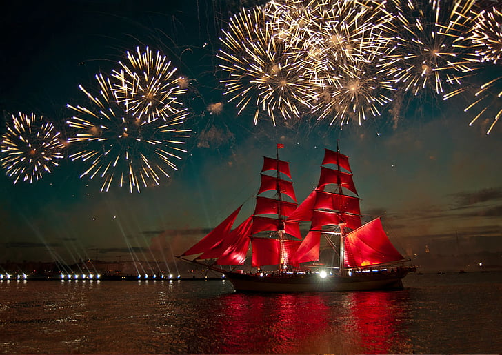red and beige ship under fireworks landscape photograph