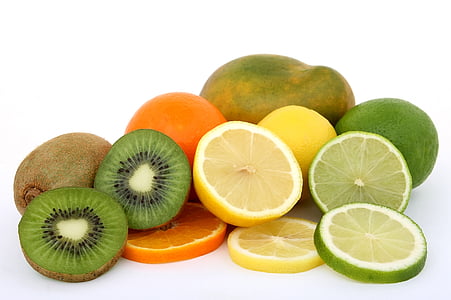 sliced kiwi, orange, lemon, and green papaya fruits