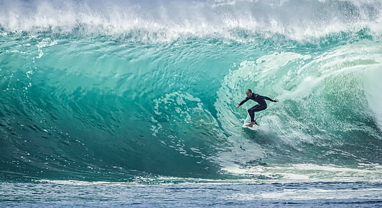 surfer under the ocean wave