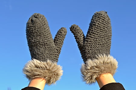 pair of gray knitted gloves