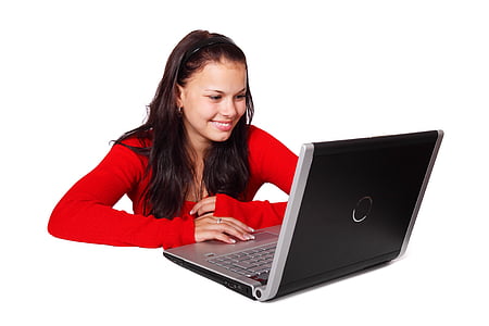 woman in red long-sleeved shirt using laptop computer