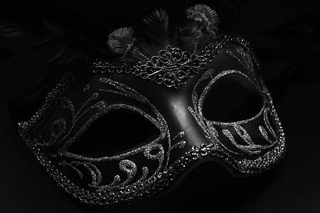 grayscale photo of silver studded masquerade