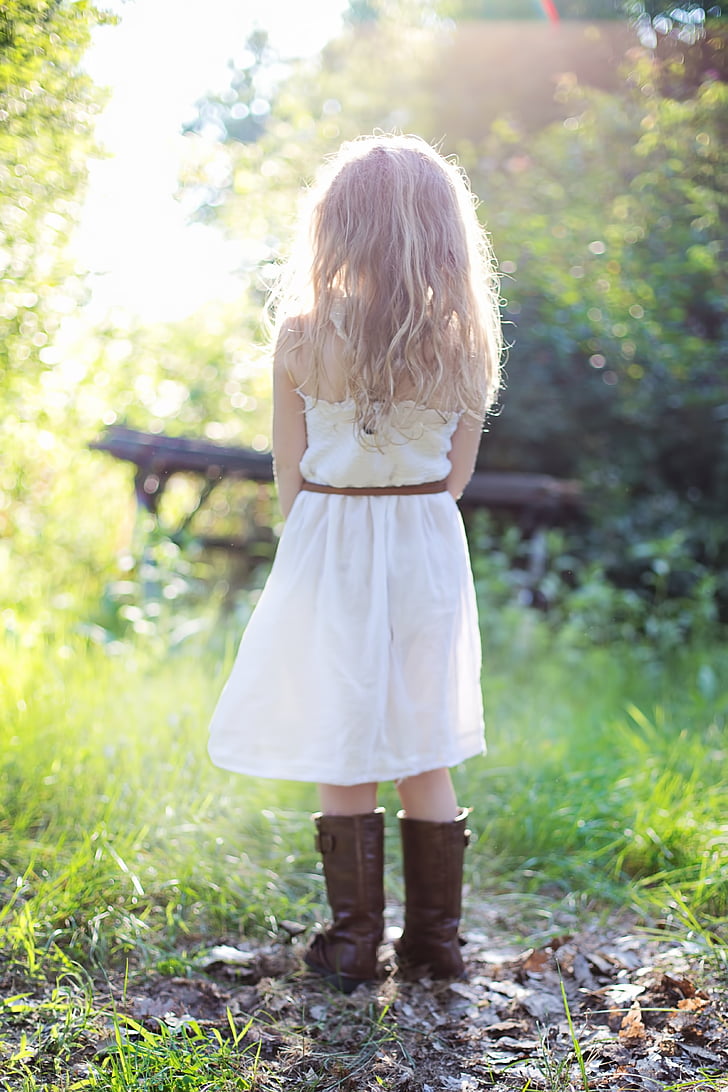 girl wearing white strapless dress