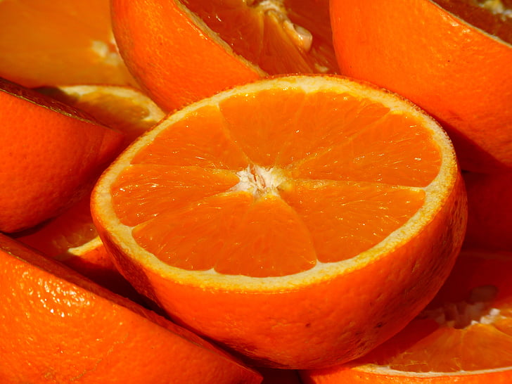 orange fruits sliced in half