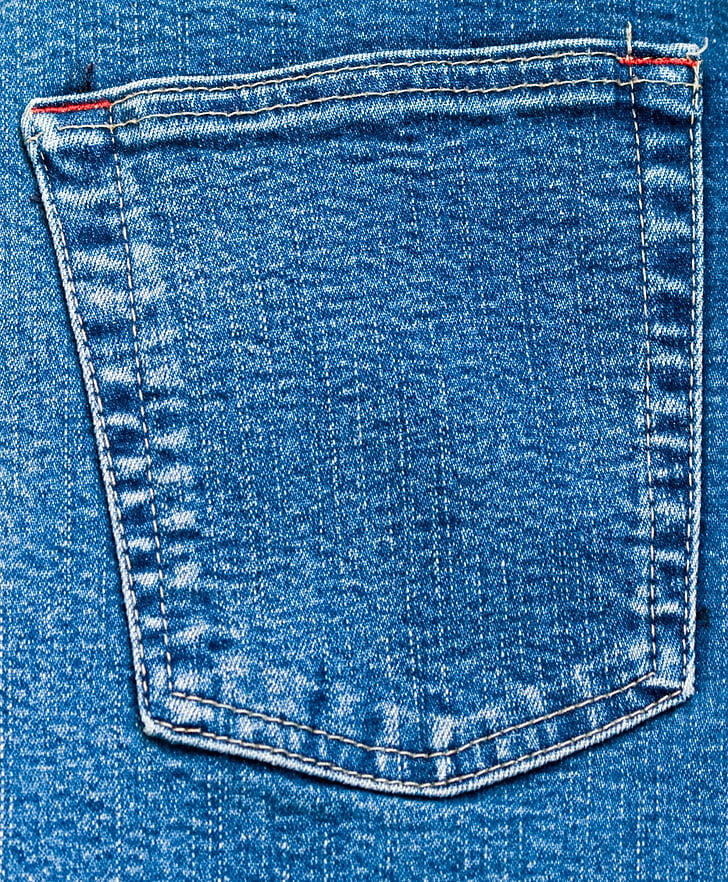 closeup photo of blue denim bottoms pocket