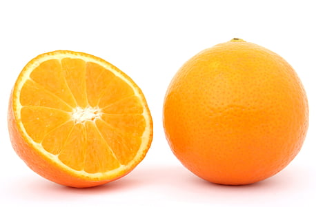 orange fruit on white surface