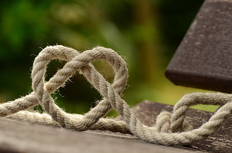 tilt lens photography of brown rope