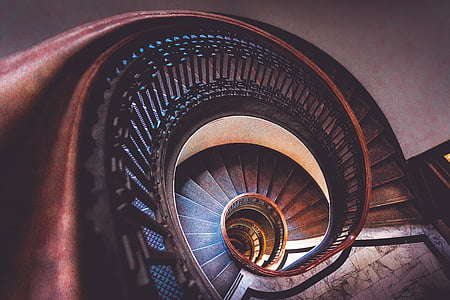 photo of brown spiral staircase