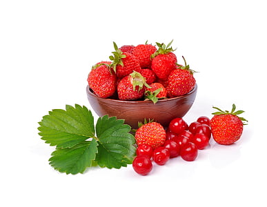 red strawberries on bowl