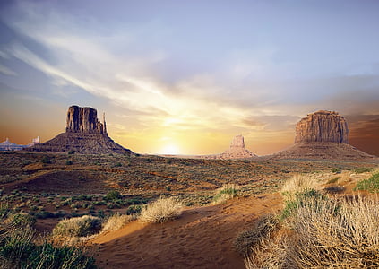 rock formations on desert during golden hour