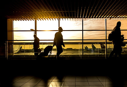 man on airport during sunset