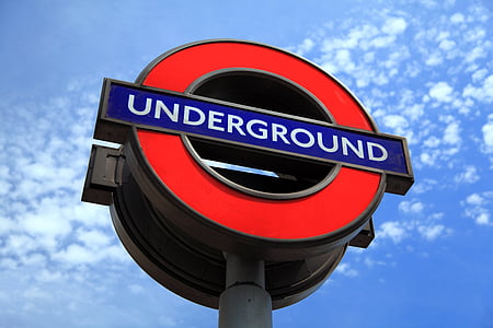 blue and red Underground signage