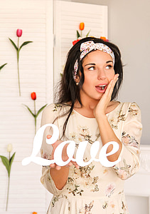 woman wearing white floral dress with Love text overlay