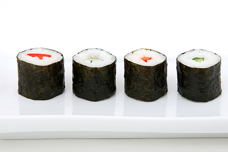 four sushi rolls