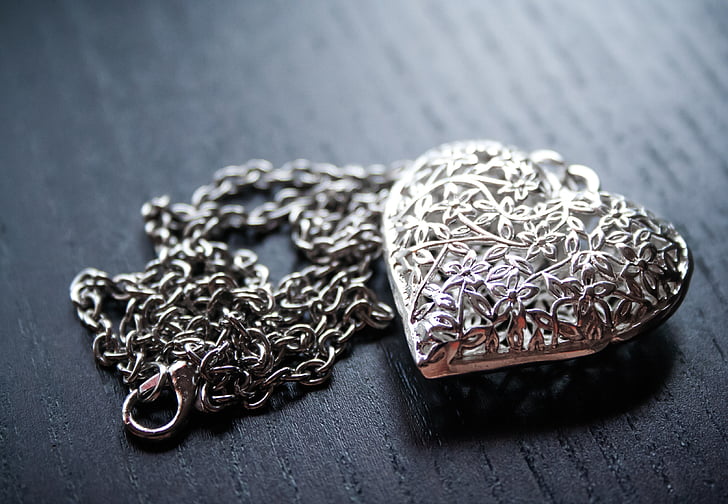 silver-color heart pendant necklace