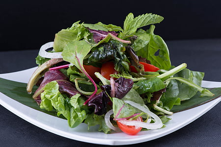 vegetable salad on white ceramic plate