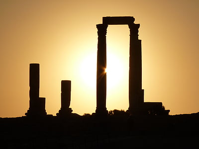 silhouette of columns during golden hour
