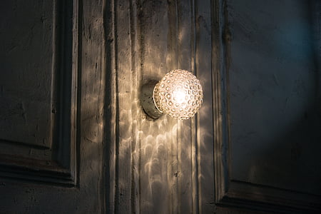 photography of white sconce