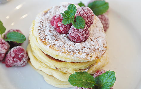 close up image of pancakes with cherry