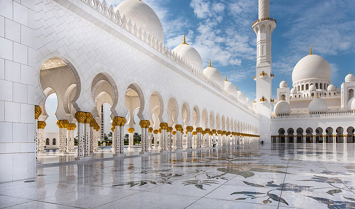 white mosque under blue sky