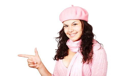 close-up photo of woman wearing pink beret and pink scarf