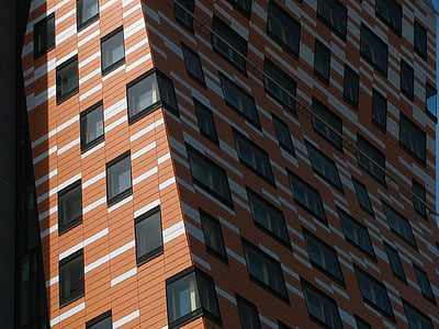 brown and white high-rise building