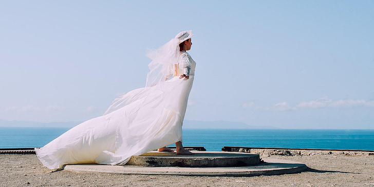 woman wearing white wedding dress
