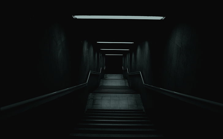 stairs leading towards dark path