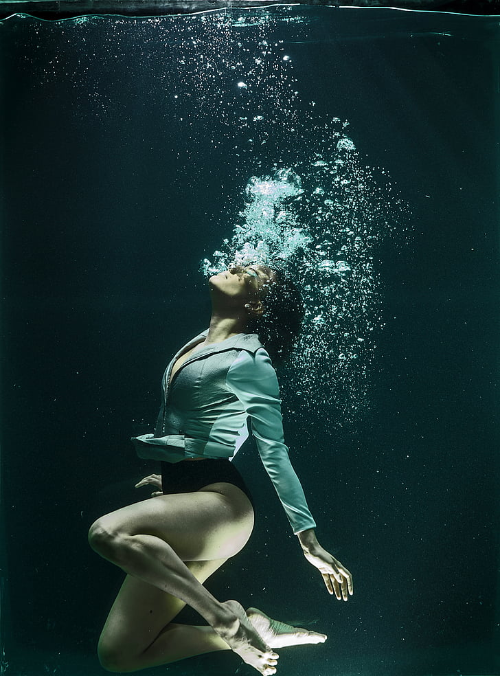 photography of woman under water