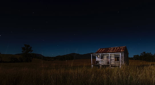 long exposure photograph of house on grass field