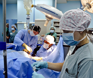 doctors performing operation